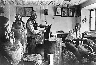 Chopping wood and making sabots, winter work for Šumava residents - historical photo 